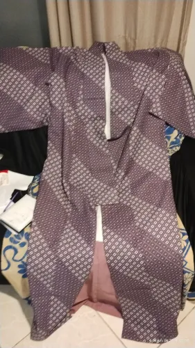 Kimono usado unissex tamanho g , podendo ser encurtado para tamanho médio.