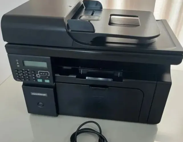 Impressora Hp laser M1212fn. 