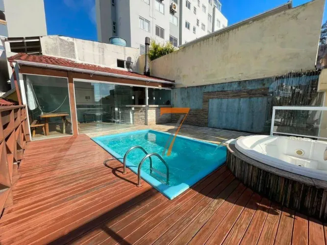 Casa com 4 dormitórios para alugar por R$ 8.759/mês - Barreiros - São José/SC