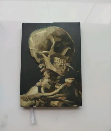 caderno van gogh skeleton with a burning cigarette