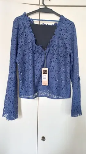 Blusa nova pop up store M