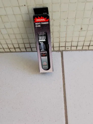 Barbeador e cortador de cabelo