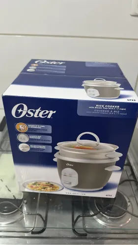 Panela elétrica Oster nova