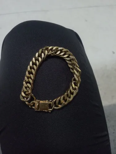 Pulseira de moeda antiga