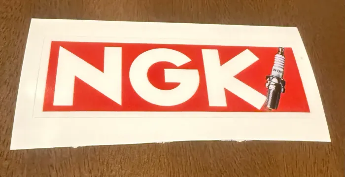 Adesivo NGK