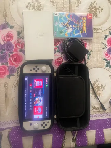 Nintendo switch oled + cartão 64gb e mala de transporte completo e sonic colors ultimate