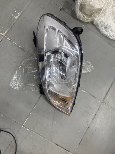 FAROL CROMADO ESQUERDO PRISMA CELTA PEÇAS 