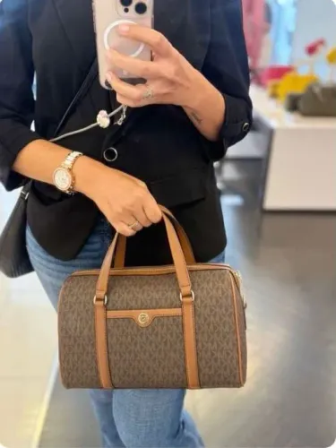 Bolsa baú média Michael Kors