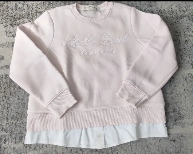Moletom Renner Fuzarka tamanho 5/6 rosa com barra de blusinha por baixo.<br>
