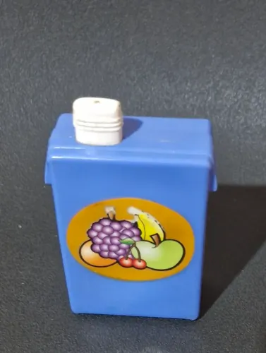Boneca ananda acessório suco 