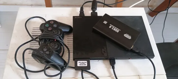Playstation 2 rodando jugos no HD com 32 jogos e 1 controle original Sony 