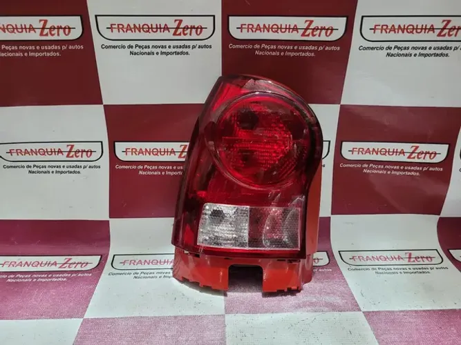 Lanterna traseira esquerda Gol G4 Nova Original ( Conferir modelo)