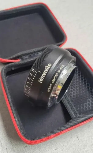 Adaptador de lente ommlite nikon para sony , ganho de luz.  Manual 