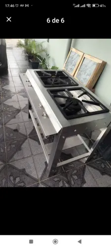 Fogão Industrial de aço inox, com sistema acendimento elétrico.