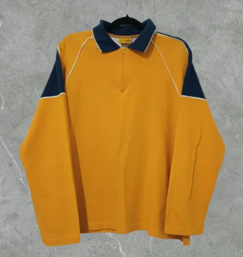 Camisa polo manga longa amarela e azul marinho
