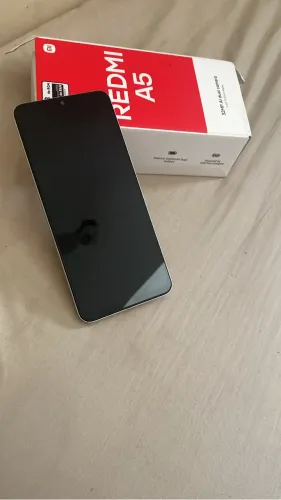 REDMI A5!! SEMI NOVO SEM MARCAS DE USO. 64G.   700$$