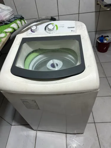Máquina de lavar com defeito