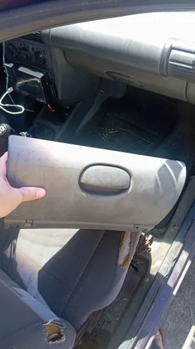Porta luvas do Corsa
