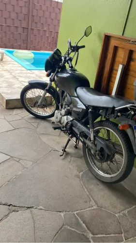 Vendo Honda fan 125,ano 2008 com bagajeiro e parida elétrica com pedal