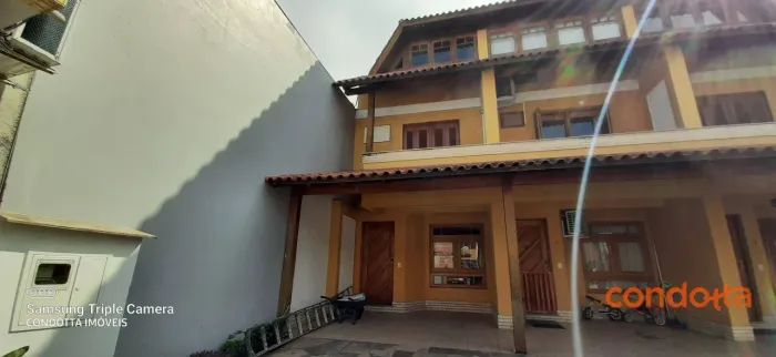 Casa com 3 dormitórios para alugar, 110 m² por R$ 3.428,00/mês - Cavalhada - Porto Alegre/