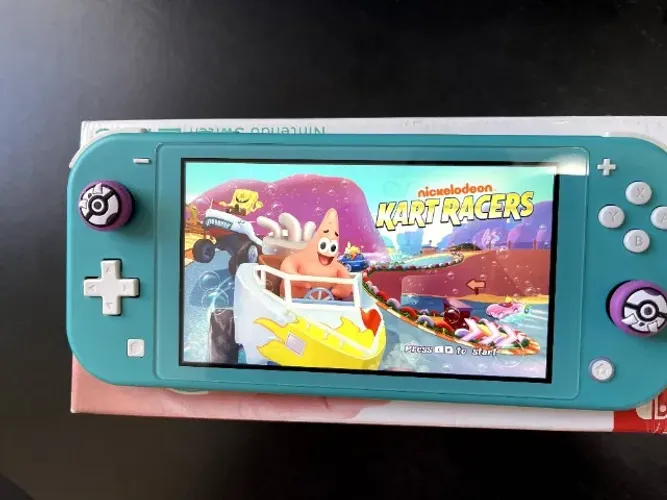 Nintendo Switch Lite Super novo + Caixa e carregador