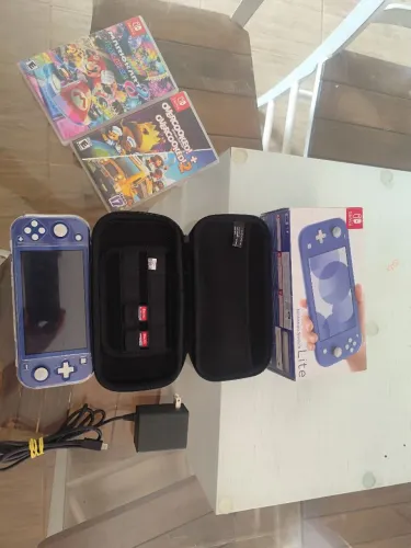 Nintendo Switch Lite + Acessórios