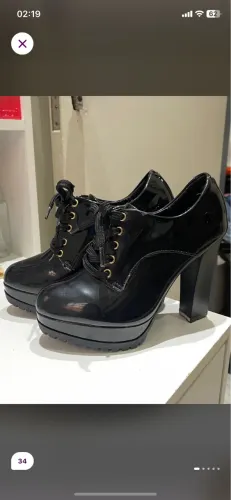 Bota salto alto