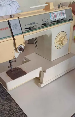 Maquina de costura singer