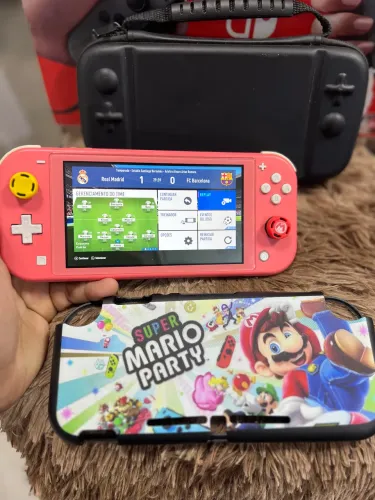 NINTENDO SWITCH LITE CORAL COM JOGO FIFA ORIGINAL