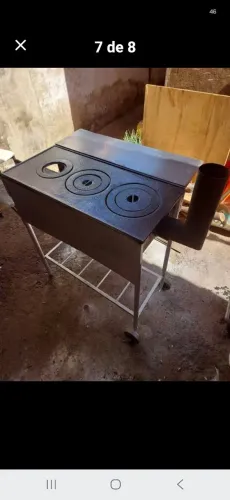 Vendo fogão e churrasqueira de ferro fundido.