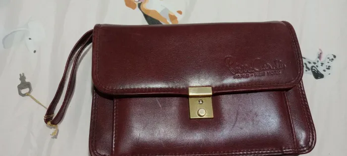 Bolsa de mão masculina de couro