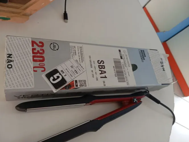 Vendo prancha de cabelo nova