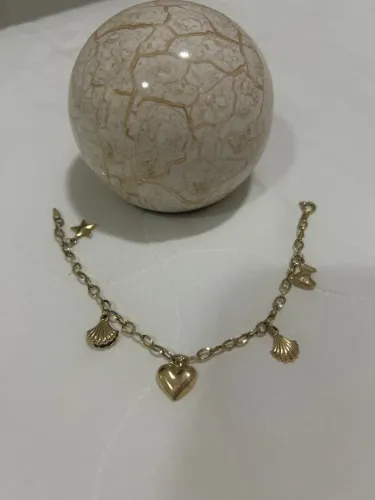 Pulseira de ouro com 5 pingentes 