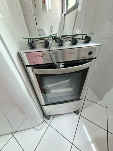 VENDE SE FOGÃO 4 BOCAS DE INOX - CONSERVADO! * PRAIA GRANDE - SP.