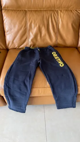 Uniforme calça do tamanho G do colégio objetivo