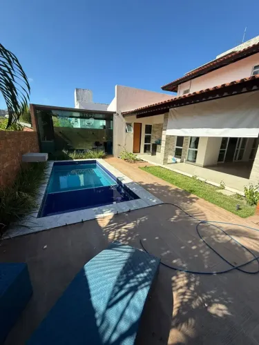 Casa de condomínio para alugar 5 suítes + área de lazer privativa com piscina