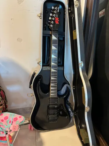 Guitarra Ibanez EX com estojo SKB