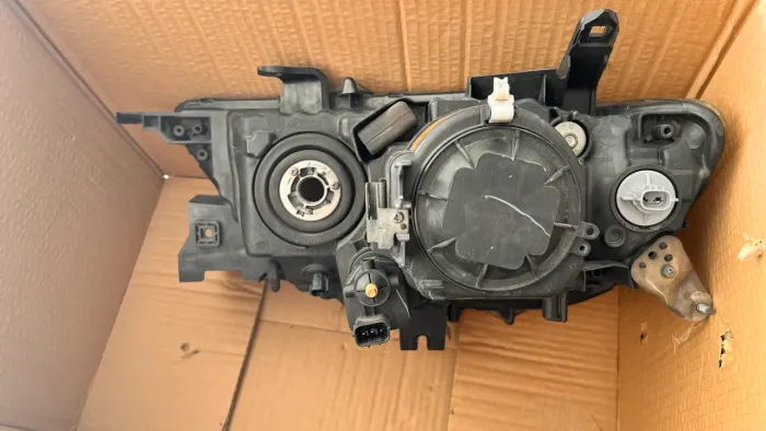 Farol Pajero Dakar Original - PAR