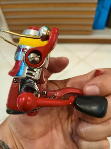 Molinete milo Joker impecável