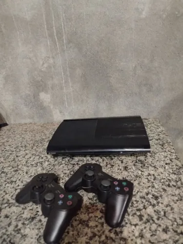 Ps3 super slim com 2 controles + de 20 jogos, aceito proca por Ps4