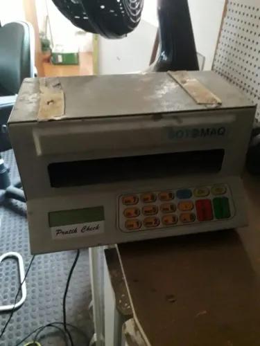 maquina de preencher cheque com defeito 