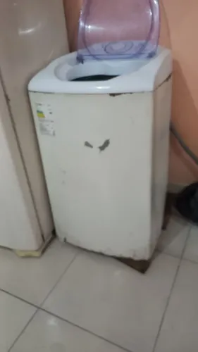 Máquina de lavar com defeito