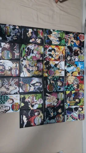 Coleção completa dos mangas de demon slayer+brinde que veio com o manga