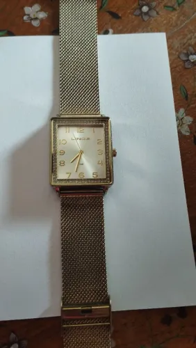 Relógio dourado marca lince 