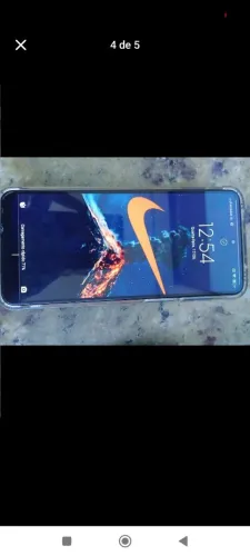 Celular xaomi 9s em bom estado um trincado atrás mais não interfere em nada