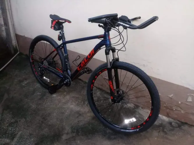 Caloi Elite Deore Azul marinho c/ laranja aro 29 Seminova linda