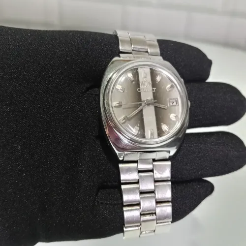 Relógio Orient Automático Date Just - Mostrador Champagne Degradê 36mm