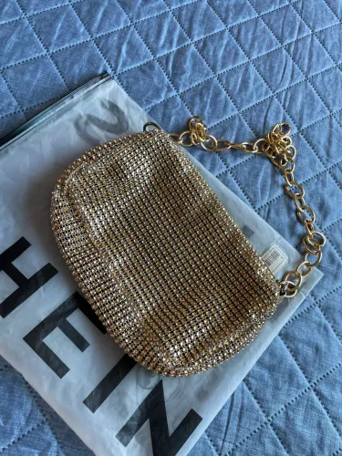 Bolsa festa dourada Shein 