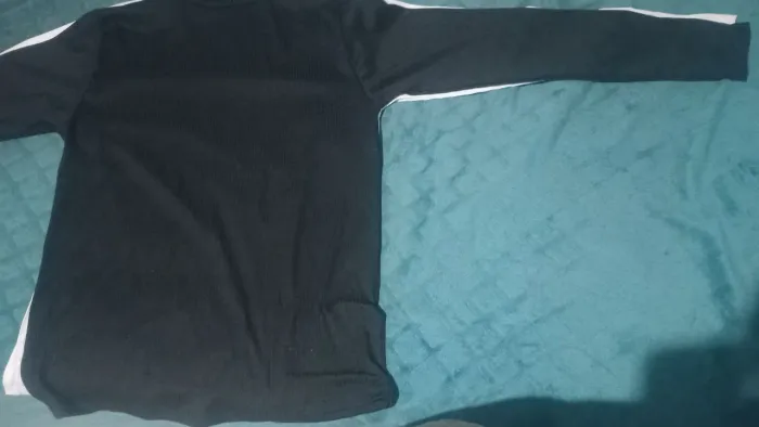 Venda de camisa manga longa e gola alta preta
