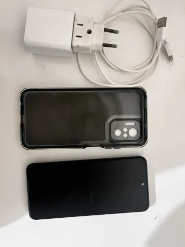 Celular Redmi Note 10S 128GB/6GB, dual SIM, c/ capinha, película e carregador. R$850